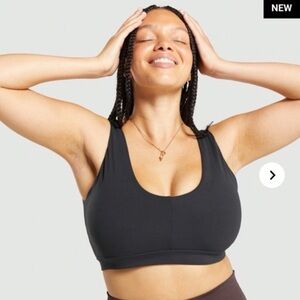 Black Whitney Simmons v2 sports bra in size M